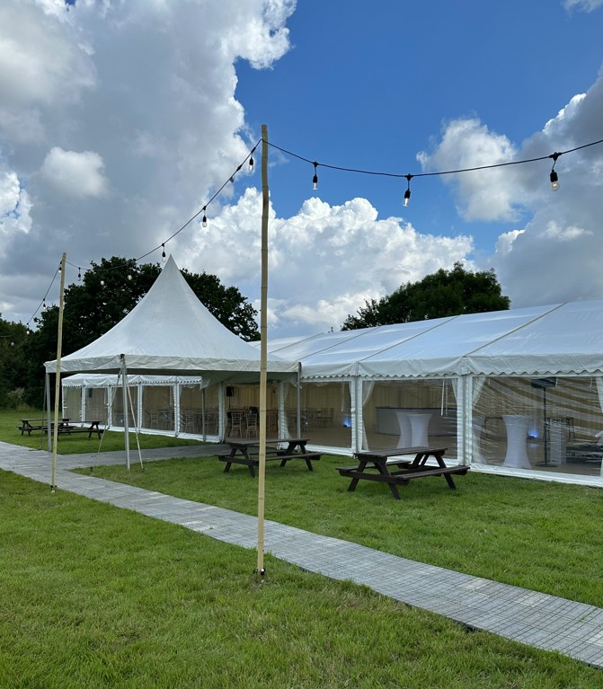Festoon lighting on bamboo poles and Rolatrac event flooring — MHC Events, Leaden Roding, Dunmow, Essex, essex
