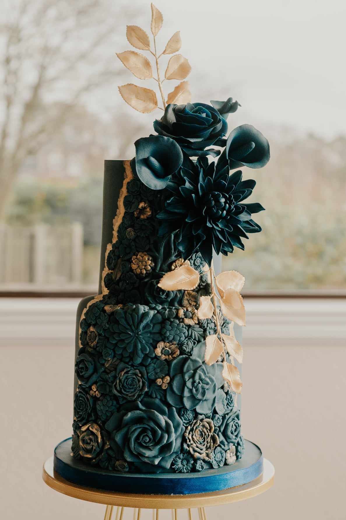 Bold, moody, and deeply textured. This is a showcase of bespoke sugar work in an unconventional palette for the modern celebration. — Crumbdidilyumptious, Glenrothes, fife