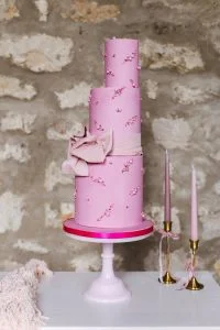 architectural lines meet bold texture. This is a contemporary take on romantic elegance in a definitive shade of pink. — Crumbdidilyumptious, Glenrothes, fife